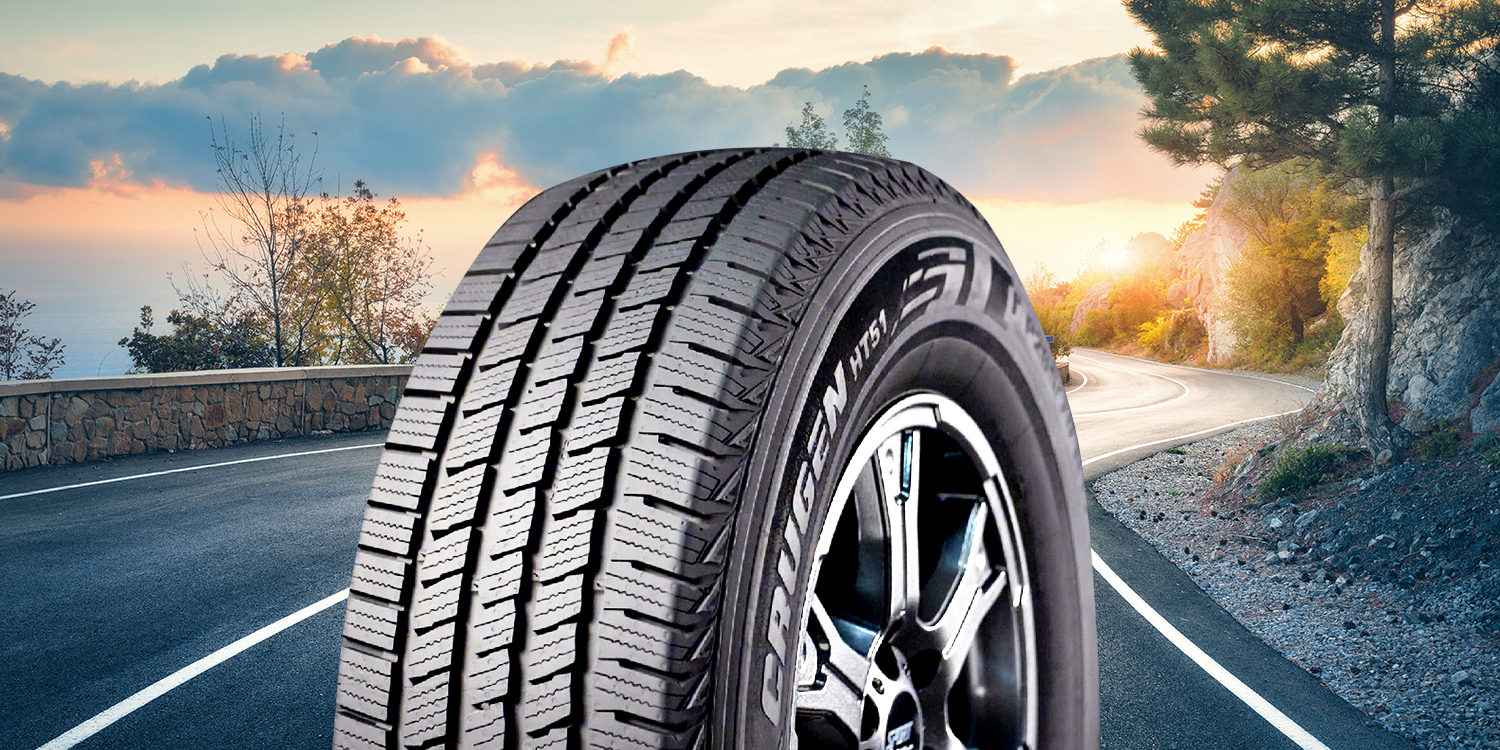 Kumho Tire image in front of a countryside road